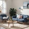 Pouf on blue carpet in bright living room interior with grey chair and settee against the wall with gallery