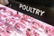 Poultry signage at the meat produce section of supermarket with defocused background