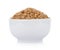 Pounded unripe rice in bowl on white background