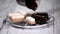 Pour the chocolate mirror glaze on a delicious mousse dessert. Liquid tasty sweet dessert cooking.