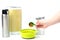 Pour food with a measuring spoon. Food serving. Isolate