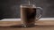 Pour milk into a freshly brewed cup of coffee - slow motion shot