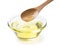 Pour the vegetable oil into a glass bowl with a wooden spoon