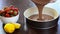 Pouring chocolate cake mixture into tin. Making pastry dough.