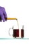 Pouring coffee from test tube