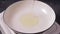 Pouring cooking oil into frying pan