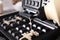 Pouring dough onto Belgian waffle maker, closeup