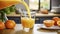 Pouring fresh orange juice into a glass with fresh fruits in background