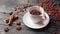 Pouring homemade coffee into a cup. Coffee beans, cinnamon sticks and a crumb on a wooden table.