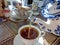 Pouring hot morning tea into a Cup from a teapot