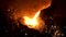 Pouring of liquid metal in open hearth workshop of the metallurgical plant. Stock footage. Smelting of the metal in the