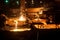 Pouring liquid titanium from arc furnace