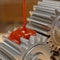 Pouring Lubricant on Gears 3d Illustration