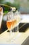 Pouring prosecco into glasses in close up