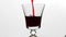 Pouring red wine of glass. Alcohol, wineglass red wine luxury pour and splash concept