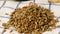 Pouring shelled sunflower seeds onto a kitchen towel