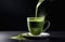 pouring traditional Japanese refreshing green matcha tea into cup on dark background