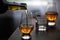 Pouring in tulip-shaped tasting glass Scotch single malt or blended whisky