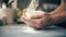 Pouring wheat flour on man`s hands, slow motion shot