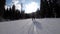 POV Beginner Girl on Skis and Amateur Skiers Slide Down on Ski Slope at Ski Resort