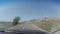 POV car moves on narrow road. View of perspective of road.