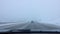 POV: Driving down the interstate freeway in Utah during a severe snowstorm.