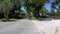 Pov Florida neighborhood vintage historic homes and beautiful scenery clear blue sky