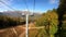 POV timelapse walk on a rope lift in the mountains in the fall.