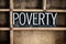 Poverty Concept Metal Letterpress Word in Drawer