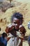 Poverty, portrait of a poor little African girl