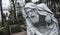 Powazki Cemetery, Warsaw, Poland, Europe, December 2018, Statue of old father time at Cemetery