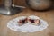 Powdered Jelly Donut on Bakers Table