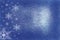 Powdery blue grungy snowflake background