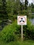 Power-driven vessels prohibited sign. Ruby Lake, Sunshine Coast, BC, Canada