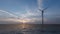 Power energy. Rural landscape. Windmill silhouette. Red background. Wind farm eco field. Blue background. Electric power