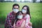 Power of family fighting covid-19 concept.Father mother and daughter wearing face mask for protect corona virus with smile and