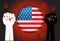 Power hand with novel corona virus or COVID-19 virus stained on the United America Flag button, Fight for american concept