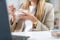 The power of healthy eating at work as a woman indulges in a delicious combination of muesli and yogurt. This nutritious meal