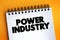 Power Industry text quote on notepad, concept background