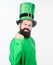 The power of the irish. Irish man with beard flexing his arm. Happy saint patricks day. Bearded man celebrating saint