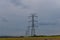 Power line against the cloudy sky.