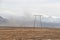 Power line in Iceland. High-voltage Electric poles in Icelandic highlands