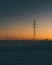 Power line support during sunrise