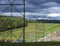 Power lines with a Dam in the background