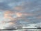 Power lines sky clouds colors orange grey