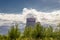 Power plant steam cooling tower on blue sky background