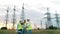 Power plant workers inspecting a vast field in daylight