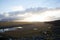 Power pole with sunset in Iceland. Light and shadow over the lan