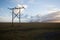 Power pole with sunset in Iceland. Light and shadow over the lan