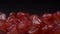 Power of pomegranate. Close up of fresh juicy pomegranate grains on a dark background